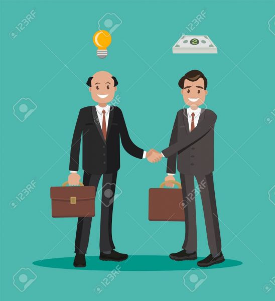 87858850 men in a business transaction idea and monetary agreement two businessmen shaking hands on a